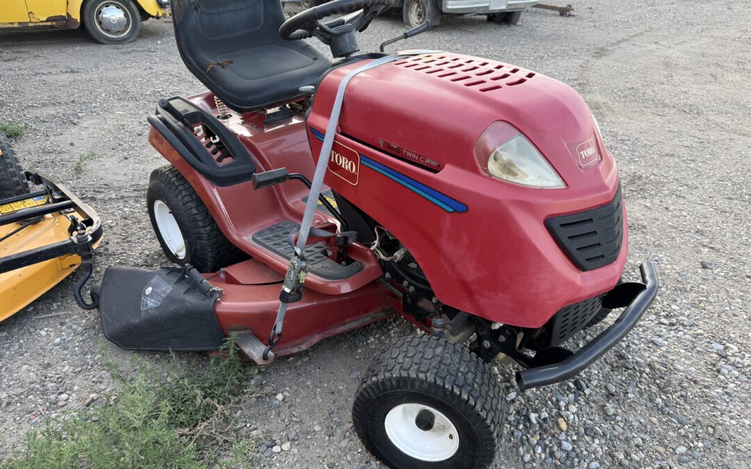 YELLOW AND RED LAWN MOWERS